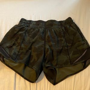 Like new green camo 4 in Lululemon shorts